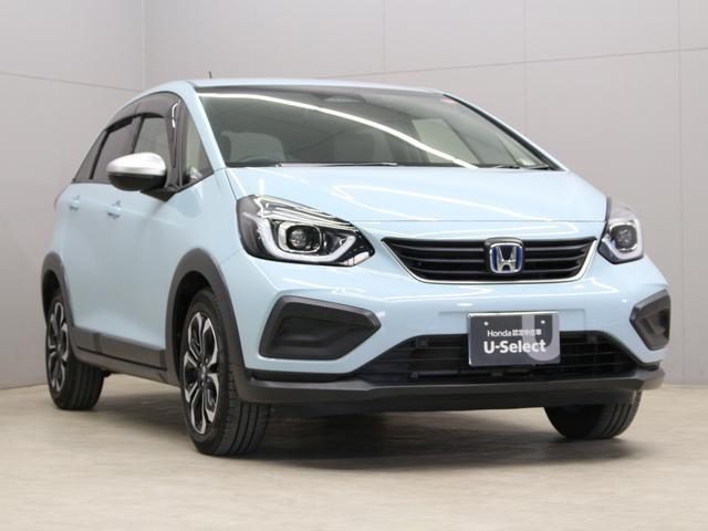 フィット e:HEVクロスター 純正9型ナビ 前後ドラレコ パーキングセンサー 渋滞追従クルーズ 電子パーキング ブレーキホールド オートハイビーム 1オーナー 禁煙 急速充電USB 純正16AW Bluetooth 車線維持支援(21枚目)