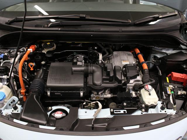 フィット e:HEVクロスター 純正9型ナビ 前後ドラレコ パーキングセンサー 渋滞追従クルーズ 電子パーキング ブレーキホールド オートハイビーム 1オーナー 禁煙 急速充電USB 純正16AW Bluetooth 車線維持支援(27枚目)