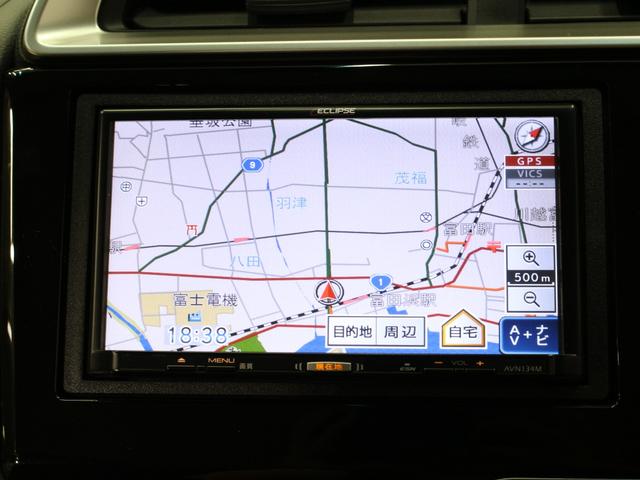 フィットハイブリッド Fパッケージ メモリーナビ Sモードスイッチ スマートキー 禁煙車 電動格納ミラー バックカメラ 横滑り防止装置 ECONスイッチ フルオートエアコン 盗難防止装置 プライバシーガラス フロアマット ETC(6枚目)