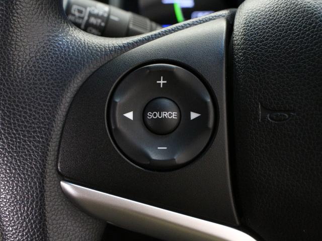 フィットハイブリッド Fパッケージ メモリーナビ Sモードスイッチ スマートキー 禁煙車 電動格納ミラー バックカメラ 横滑り防止装置 ECONスイッチ フルオートエアコン 盗難防止装置 プライバシーガラス フロアマット ETC(8枚目)