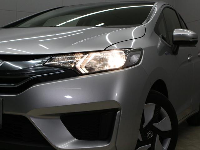 フィットハイブリッド Fパッケージ メモリーナビ Sモードスイッチ スマートキー 禁煙車 電動格納ミラー バックカメラ 横滑り防止装置 ECONスイッチ フルオートエアコン 盗難防止装置 プライバシーガラス フロアマット ETC(16枚目)