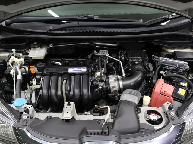 フィットハイブリッド Fパッケージ メモリーナビ Sモードスイッチ スマートキー 禁煙車 電動格納ミラー バックカメラ 横滑り防止装置 ECONスイッチ フルオートエアコン 盗難防止装置 プライバシーガラス フロアマット ETC(25枚目)