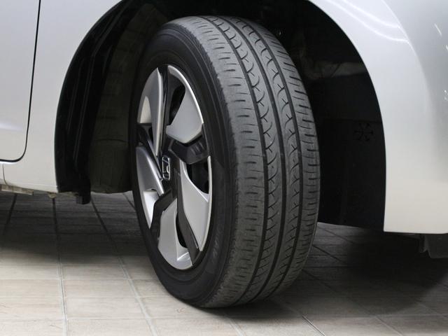 フィットハイブリッド Fパッケージ メモリーナビ Sモードスイッチ スマートキー 禁煙車 電動格納ミラー バックカメラ 横滑り防止装置 ECONスイッチ フルオートエアコン 盗難防止装置 プライバシーガラス フロアマット ETC(26枚目)