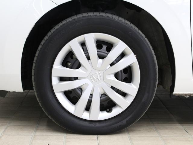 フィット ｅ：ＨＥＶホーム　２トーンカラー　純正９型ナビ　ドラレコ　パーキングセンサー　渋滞追従クルーズ　電子パーキング　ブレーキホールド　オートハイビーム　１オーナー　禁煙　車線維持支援　ハーフレザー　本革巻ステアリング（33枚目）