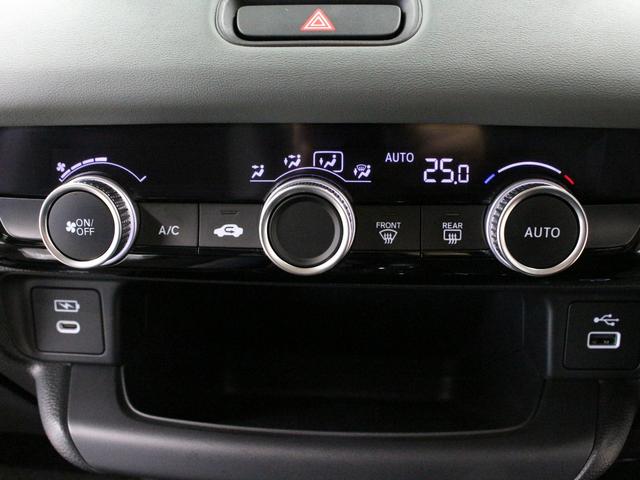 ヴェゼル e:HEVX・HuNTパッケージ 当社試乗車 純正9型ナビ 専用エクステリア ルーフレール 渋滞追従クルーズ 電子パーキング ブレーキホールド 車線維持支援 パーキングセンサー オートハイビーム 純正16AW 本革巻ステアリング 禁煙(48枚目)