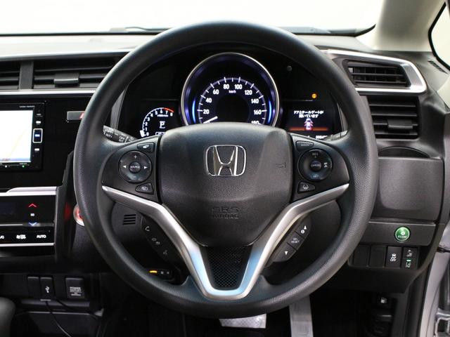 フィット 13G・Lホンダセンシング 衝突軽減ブレーキ 純正ナ LEDヘッド&フォグ アダプティブクルーズ 車線維持支援 誤発進抑制装置 ワンオーナー 禁煙車 Bluetooth ステアリングリモコン ドアバイザー アイドリングストップ(11枚目)