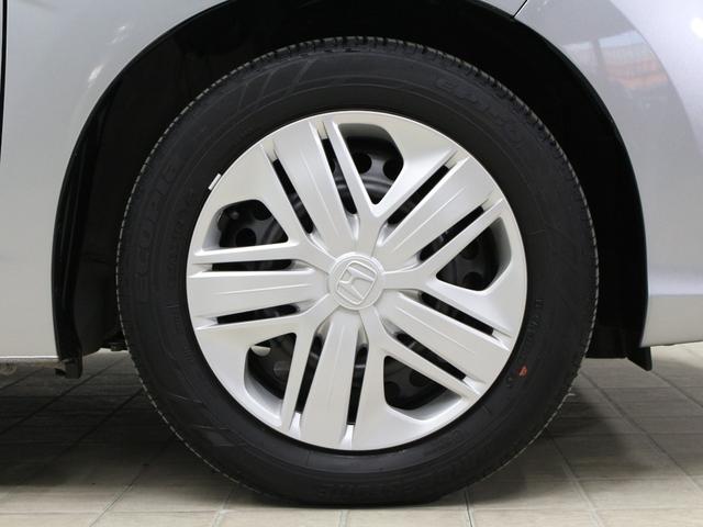 フィット 13G・Lホンダセンシング 衝突軽減ブレーキ 純正ナ LEDヘッド&フォグ アダプティブクルーズ 車線維持支援 誤発進抑制装置 ワンオーナー 禁煙車 Bluetooth ステアリングリモコン ドアバイザー アイドリングストップ(27枚目)