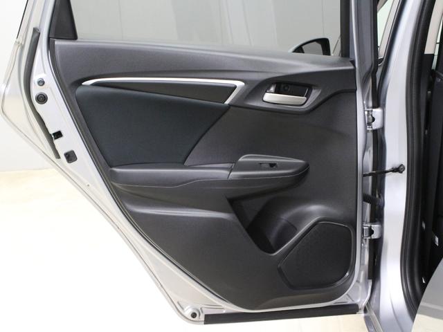 フィット 13G・Lホンダセンシング 衝突軽減ブレーキ 純正ナ LEDヘッド&フォグ アダプティブクルーズ 車線維持支援 誤発進抑制装置 ワンオーナー 禁煙車 Bluetooth ステアリングリモコン ドアバイザー アイドリングストップ(63枚目)