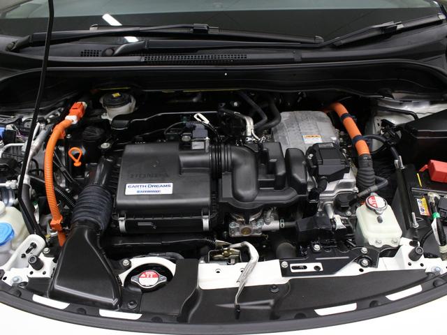 フィット ｅ：ＨＥＶホーム　純正８型ナビ　前後ドラレコ　渋滞追従クルーズ　電子パーキング　パーキングセンサー　ブレーキホールド　オートハイビーム　ワンオーナー　ハーフレザー　本革巻ステアリング　純正１６ＡＷ　Ｂｌｕｅｔｏｏｔｈ（19枚目）