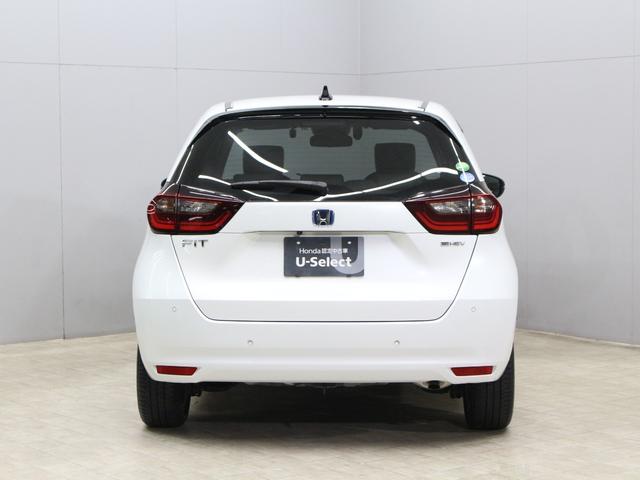 フィット ｅ：ＨＥＶホーム　純正８型ナビ　前後ドラレコ　渋滞追従クルーズ　電子パーキング　パーキングセンサー　ブレーキホールド　オートハイビーム　ワンオーナー　ハーフレザー　本革巻ステアリング　純正１６ＡＷ　Ｂｌｕｅｔｏｏｔｈ（22枚目）
