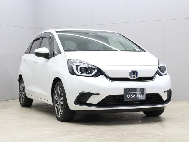 フィット ｅ：ＨＥＶホーム　純正８型ナビ　前後ドラレコ　渋滞追従クルーズ　電子パーキング　パーキングセンサー　ブレーキホールド　オートハイビーム　ワンオーナー　ハーフレザー　本革巻ステアリング　純正１６ＡＷ　Ｂｌｕｅｔｏｏｔｈ（23枚目）