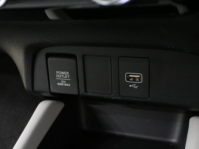 フィット ｅ：ＨＥＶホーム　純正８型ナビ　前後ドラレコ　渋滞追従クルーズ　電子パーキング　パーキングセンサー　ブレーキホールド　オートハイビーム　ワンオーナー　ハーフレザー　本革巻ステアリング　純正１６ＡＷ　Ｂｌｕｅｔｏｏｔｈ（52枚目）