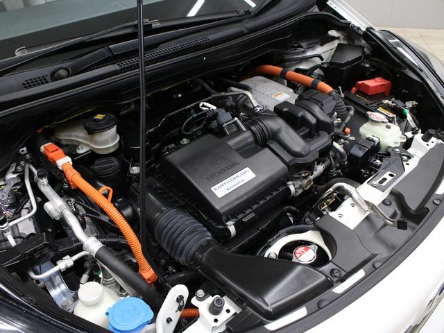 フィット ｅ：ＨＥＶホーム　純正８型ナビ　前後ドラレコ　渋滞追従クルーズ　電子パーキング　パーキングセンサー　ブレーキホールド　オートハイビーム　ワンオーナー　ハーフレザー　本革巻ステアリング　純正１６ＡＷ　Ｂｌｕｅｔｏｏｔｈ（76枚目）