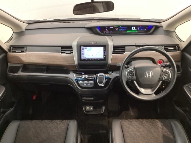 フリードハイブリッド ハイブリッド・クロスターホンダセンシング　最長５年保証　ワンオ－ナ－　ナビＶＸＭ－２１４ＶＦｉ　ＴＶ　Ｒカメラ　ＣＤ録音　ＢＴオ－ディオ　ＤＶＤ　ＥＴＣ　ＬＥＤライト　両側電動ドア　ＶＳＡ　シ－トヒ－タ－　クルコン　アルミ　スマ－トキ－ＡＡＣ（9枚目）