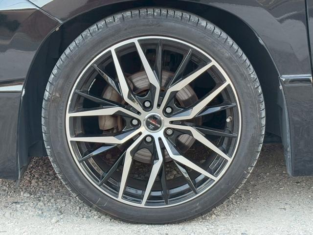 ヴェルファイア ２．４Ｚ　ゴールデンアイズ　禁煙　　純正９インチナビＴＶ　フリップダウン　Ｂｌｕｅｔｏｏｔｈ　ＤＶＤ再生　両側電動スライドドア　電動リアゲート　１９インチアルミ　ＨＩＤヘッド　ハーフレザー　Ｗエアコン　ウッドコンビハンドル（57枚目）