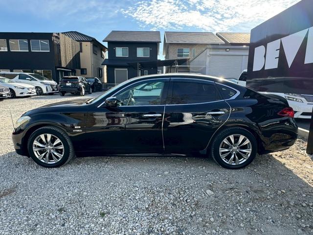 フーガハイブリッド VIPパッケージ フルレザー 衝突軽減 シートH/C 純正ナビ バック/サイドカメラ レーダークルーズ 後席シートヒーター オットマン リアサンシェード 電動シート シートメモリー オートライト(22枚目)