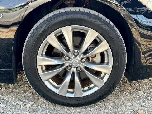 フーガハイブリッド VIPパッケージ フルレザー 衝突軽減 シートH/C 純正ナビ バック/サイドカメラ レーダークルーズ 後席シートヒーター オットマン リアサンシェード 電動シート シートメモリー オートライト(24枚目)