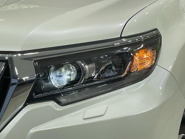 ランドクルーザープラド TX Lパッケージ ムーンルーフ モデリスタエアロ 7人乗 ベージュ内装 9インチディスプレイ 全周囲カメラ シルバールーフレール 禁煙車 セーフティセンス レーダークルーズ ブラインドスポットモニター(31枚目)