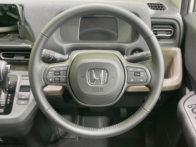 フリード エアー　ＥＸ　登録済未使用車　ホンダセンシング　アダプティブクルーズ　ブラインドスポットモニター　両側電動スライドドア　ＬＥＤヘッドライト　スマートキー　オートエアコン　革巻きステアリング　シートヒーター（11枚目）