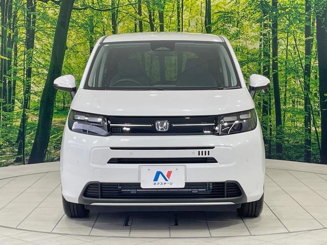 フリード エアー　ＥＸ　登録済未使用車　ホンダセンシング　アダプティブクルーズ　ブラインドスポットモニター　両側電動スライドドア　ＬＥＤヘッドライト　スマートキー　オートエアコン　革巻きステアリング　シートヒーター（14枚目）