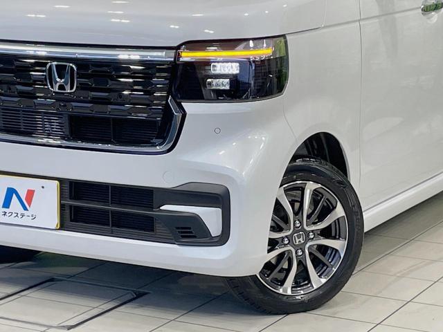 N-BOXカスタム ベースグレード 届出済未使用車 電動スライドドア ホンダセンシング アダプティブクルーズ スマートキー シートヒーター LEDヘッドライト オートエアコン 純正14インチアルミ クリアランスソナー オートライト(12枚目)