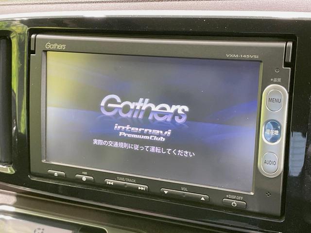 Ｎ－ＯＮＥ プレミアム・Ｌパッケージ　純正ナビ　バックカメラ　禁煙車　スマートキー　ＨＩＤヘッド　ＥＴＣ　純正１４インチアルミ　オートライト　オートエアコン　Ｂｌｕｅｔｏｏｔｈ　ＣＤ　ＤＶＤ　革巻きステアリング　盗難防止装置（3枚目）