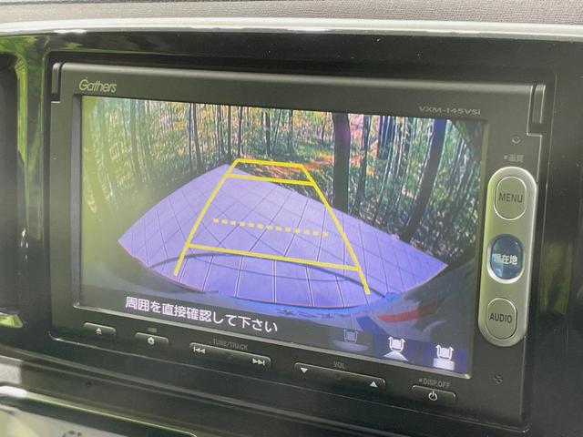Ｎ－ＯＮＥ プレミアム・Ｌパッケージ　純正ナビ　バックカメラ　禁煙車　スマートキー　ＨＩＤヘッド　ＥＴＣ　純正１４インチアルミ　オートライト　オートエアコン　Ｂｌｕｅｔｏｏｔｈ　ＣＤ　ＤＶＤ　革巻きステアリング　盗難防止装置（4枚目）