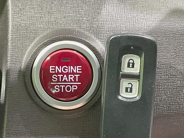 Ｎ－ＯＮＥ プレミアム・Ｌパッケージ　純正ナビ　バックカメラ　禁煙車　スマートキー　ＨＩＤヘッド　ＥＴＣ　純正１４インチアルミ　オートライト　オートエアコン　Ｂｌｕｅｔｏｏｔｈ　ＣＤ　ＤＶＤ　革巻きステアリング　盗難防止装置（7枚目）