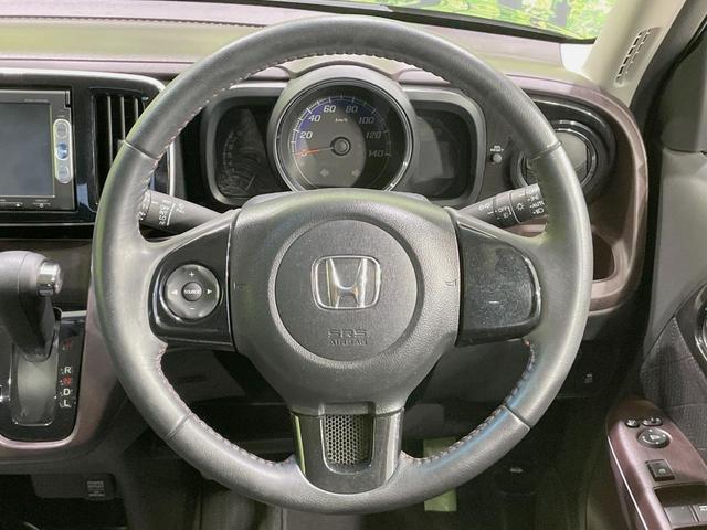Ｎ－ＯＮＥ プレミアム・Ｌパッケージ　純正ナビ　バックカメラ　禁煙車　スマートキー　ＨＩＤヘッド　ＥＴＣ　純正１４インチアルミ　オートライト　オートエアコン　Ｂｌｕｅｔｏｏｔｈ　ＣＤ　ＤＶＤ　革巻きステアリング　盗難防止装置（11枚目）