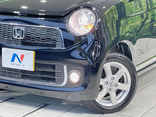 Ｎ－ＯＮＥ プレミアム・Ｌパッケージ　純正ナビ　バックカメラ　禁煙車　スマートキー　ＨＩＤヘッド　ＥＴＣ　純正１４インチアルミ　オートライト　オートエアコン　Ｂｌｕｅｔｏｏｔｈ　ＣＤ　ＤＶＤ　革巻きステアリング　盗難防止装置（12枚目）