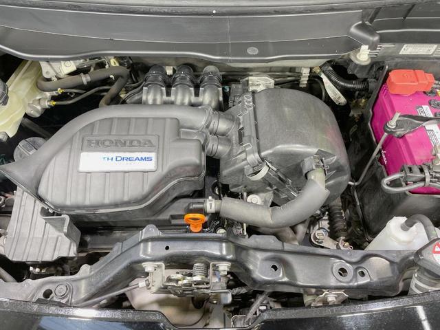 Ｎ－ＯＮＥ プレミアム・Ｌパッケージ　純正ナビ　バックカメラ　禁煙車　スマートキー　ＨＩＤヘッド　ＥＴＣ　純正１４インチアルミ　オートライト　オートエアコン　Ｂｌｕｅｔｏｏｔｈ　ＣＤ　ＤＶＤ　革巻きステアリング　盗難防止装置（18枚目）