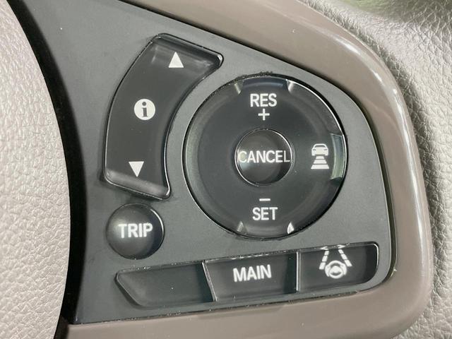 Ｎ－ＢＯＸ Ｇ・Ｌホンダセンシング　純正ナビ　電動スライドドア　ホンダセンシング　バックカメラ　アダプティブクルーズ　禁煙車　ＬＥＤヘッドライト　シートヒーター　スマートキー　充電用ＵＳＢ端子　オートハイビーム　オートエアコン（6枚目）