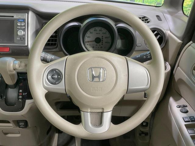 Ｎ－ＢＯＸ Ｇ・Ｌパッケージ　純正ナビ　電動スライドドア　バックカメラ　禁煙車　スマートキー　ＥＴＣ　オートエアコン　ＣＤ　ＤＶＤ　ステアリングスイッチ　電動格納ミラー　盗難防止装置　プライバシーガラス（11枚目）