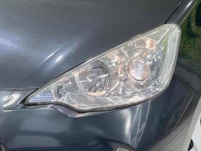 アクア Ｇ　ＳＤナビ　禁煙車　スマートキー　シートヒーター　ＥＴＣ　オートライト　オートエアコン　ＤＶＤ再生　フルセグ　革巻きステアリング　アームレスト　ステアリングスイッチ　盗難防止装置　プライバシーガラス（29枚目）