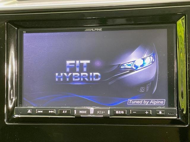 フィットハイブリッド Ｌパッケージ　ＳＤナビ　バックカメラ　禁煙車　スマートキー　ＬＥＤヘッド　ＥＴＣ　クルーズコントロール　オートライト　オートエアコン　Ｂｌｕｅｔｏｏｔｈ　ＣＤ　ＤＶＤ　盗難防止装置（3枚目）