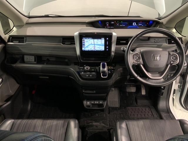 フリードハイブリッド ハイブリッド・Ｇホンダセンシング　４ＷＤ　１年保証　ワンオ－ナ－　純正ナビ　ＴＶ　Ｒカメラ　ＢＴオーディオ　ＤＶＤ　ＥＴＣ　ＬＥＤライト　フォグライト　ＶＳＡ　両側電動　クルコン　アルミ　スマ－トキ－　整備記録簿　ドアバイザ－　禁煙（9枚目）