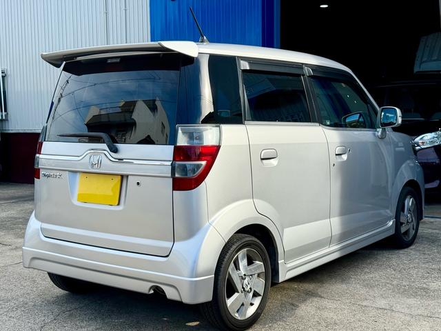 ゼストスパーク Ｗ　車検２年付き　禁煙車　カーナビ　フルセグＴＶ　ＤＶＤ　ＣＤ　スマートキー　プロジェクターＨＩＤヘッド　フォグランプ　ウインカーミラー　メッキグリル　リアウィング（6枚目）