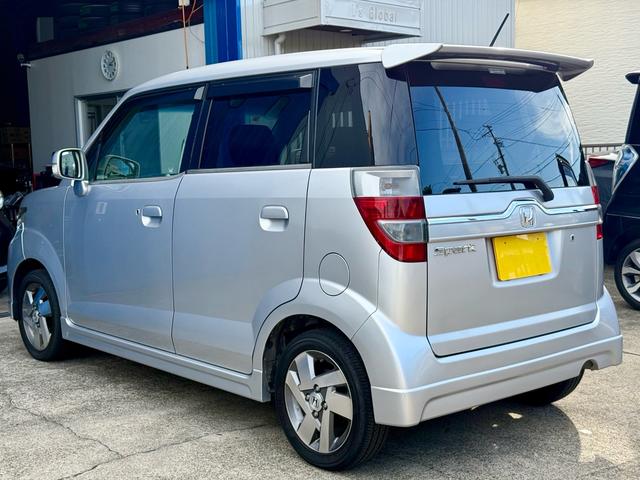 ゼストスパーク Ｗ　車検２年付き　禁煙車　カーナビ　フルセグＴＶ　ＤＶＤ　ＣＤ　スマートキー　プロジェクターＨＩＤヘッド　フォグランプ　ウインカーミラー　メッキグリル　リアウィング（8枚目）