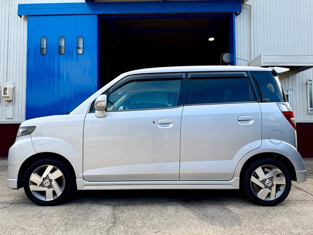 ゼストスパーク Ｗ　車検２年付き　禁煙車　カーナビ　フルセグＴＶ　ＤＶＤ　ＣＤ　スマートキー　プロジェクターＨＩＤヘッド　フォグランプ　ウインカーミラー　メッキグリル　リアウィング（9枚目）