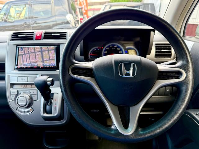 ゼストスパーク Ｗ　車検２年付き　禁煙車　カーナビ　フルセグＴＶ　ＤＶＤ　ＣＤ　スマートキー　プロジェクターＨＩＤヘッド　フォグランプ　ウインカーミラー　メッキグリル　リアウィング（12枚目）
