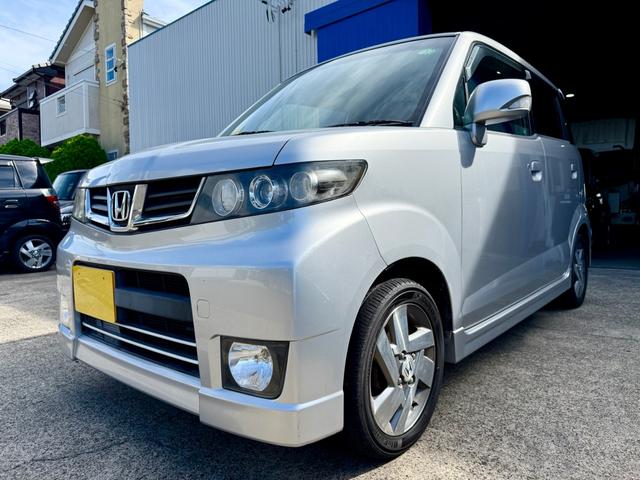 ゼストスパーク Ｗ　車検２年付き　禁煙車　カーナビ　フルセグＴＶ　ＤＶＤ　ＣＤ　スマートキー　プロジェクターＨＩＤヘッド　フォグランプ　ウインカーミラー　メッキグリル　リアウィング（22枚目）