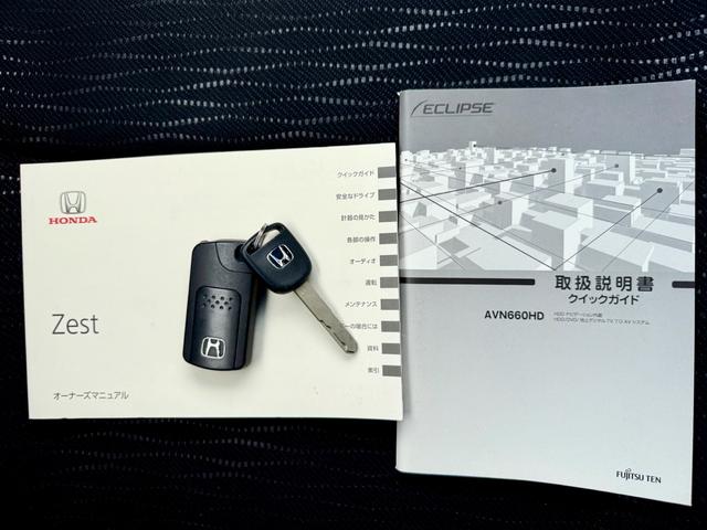 ゼストスパーク Ｗ　車検２年付き　禁煙車　カーナビ　フルセグＴＶ　ＤＶＤ　ＣＤ　スマートキー　プロジェクターＨＩＤヘッド　フォグランプ　ウインカーミラー　メッキグリル　リアウィング（35枚目）