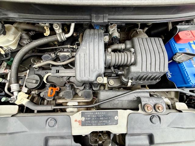 ゼストスパーク Ｗ　車検２年付き　禁煙車　カーナビ　フルセグＴＶ　ＤＶＤ　ＣＤ　スマートキー　プロジェクターＨＩＤヘッド　フォグランプ　ウインカーミラー　メッキグリル　リアウィング（36枚目）
