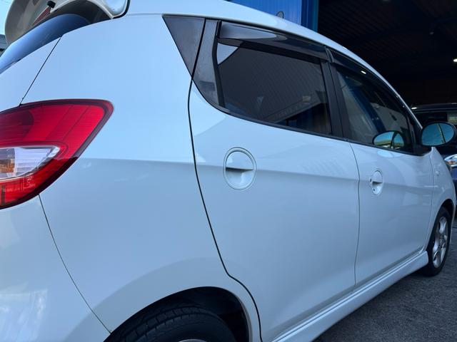 セルボ ＴＸ　ターボ　車検２年付き　禁煙車　スマートキー２個付　パナソニックカーナビ　フルセグＴＶ　ＤＶＤ　ＨＤＤ録音　純正１４インチアルミホイール　純正３点エアロスポイラー　純正リアウィング　電動格納ミラー（23枚目）