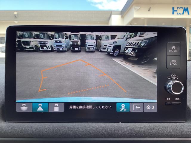 シビック タイプＲ　レーシングブラックパッケージ　登録済未使用車　衝突軽減　純正ナビ　フルセグ　Ｂｌｕｅｔｏｏｔｈ　スマホ連携　ＬＥＤヘッドライト　レーダークルーズコントロール　クリアランスソナー　ビルトインＥＴＣ　スマートキー　プッシュスタート（6枚目）