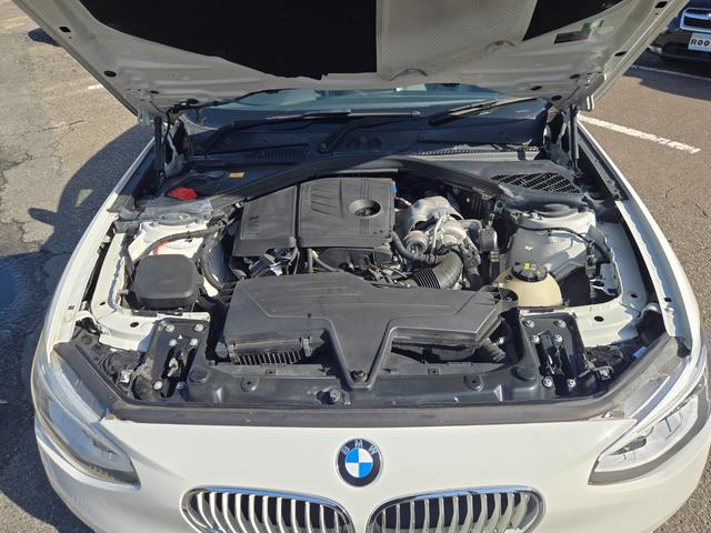 1シリーズ 116i スタイル 第3者機関AIS鑑定書付き 禁煙車 地デジチューナー(インターフェイス) 純正ナビ バックカメラ ドライブレコーダー ミラー一体型ETC ハーフレザーシート 純正アルミ エンジンプッシュスタート(3枚目)