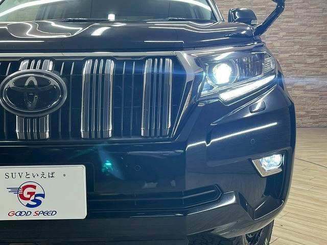 ランドクルーザープラド ＴＸ　リフトアップ　社外１７インチアルミ　オールテレーンタイヤ　　サンルーフ　１１型アルパインフローティングナビ　バックカメラ　後席フリップダウンモニター　７人乗　追従クルーズコントロール　レーンアシスト（20枚目）