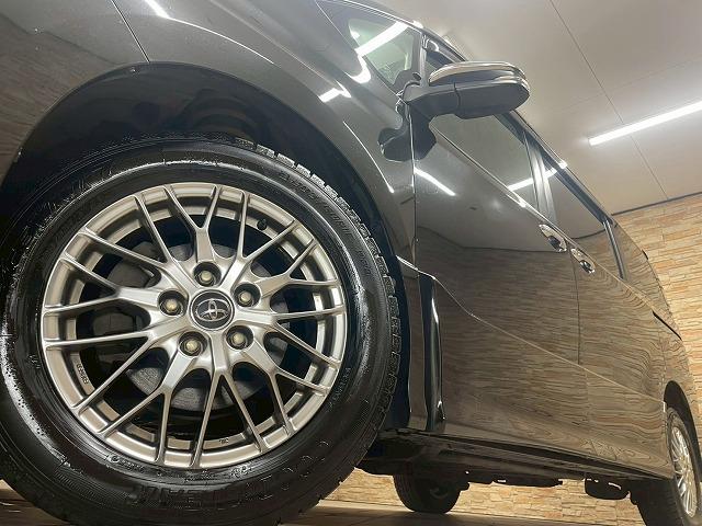 ヴォクシー ＺＳ　煌ＩＩ　４ＷＤ　両側電動スライド　クルコン　ＥＴＣ　純正９インチナビＴＶ　バックカメラ　ドライブレコーダー　オートエアコン　Ｂｌｕｅｔｏｏｔｈ　ＥＴＣ　セーフティセンス　クルコン　純正１６ｉｎＡＷ（63枚目）