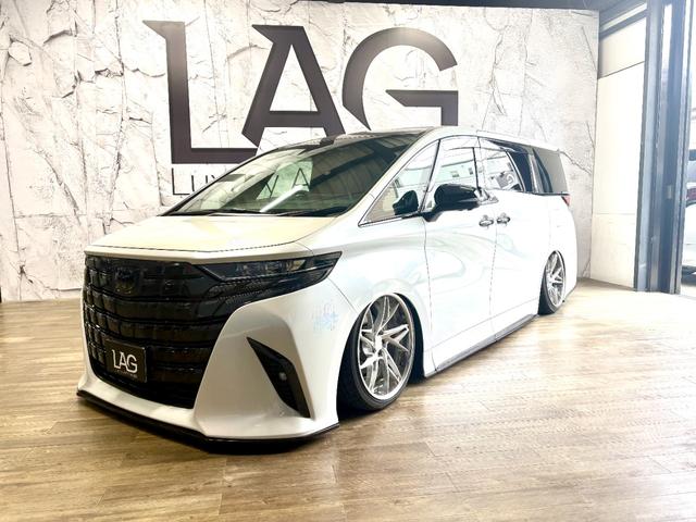 アルファード 　ＡＣＣエアサスＯＧ公認　ＬＡＧカーボンエアロ　ＬＡＧ可変式マフラー　ＬＡＧアームＦ４度Ｒ５度　カーボンラッピング　鍛造２１インチ　セキュリティー　トヨタエンスタ　ムーンルーフ　デジタルインナーミラー（3枚目）