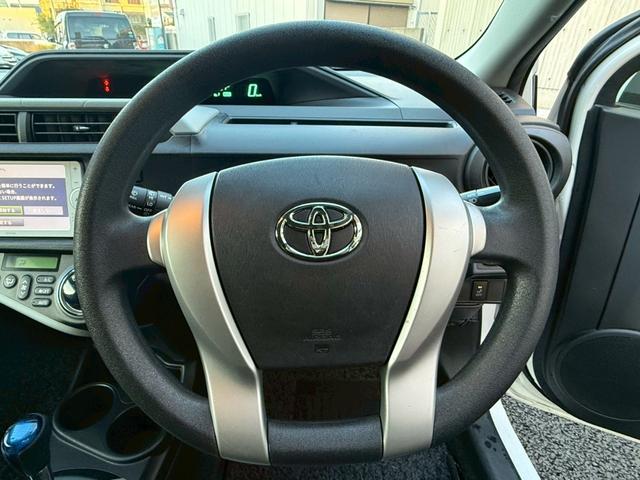 アクア Ｓ　禁煙車　スマートキー　純正ＳＤナビ　Ｂｌｕｅｔｏｏｔｈ　ワンセグ　オートライト　オートエアコン　シートリフター　ウィンカーミラー　リアスポイラー　ＥＶモード　ＥＣＯモード（6枚目）